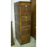 FILING CABINET, 147cm H x 39cm x 63cm, early 20th century oak of four drawers.