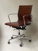 REVOLVING DESK CHAIR, Charles and Ray Eames inspired with ribbed mid brown leather seat, revolving