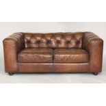 SOFA, 1970s brass studded, stitched and buttoned tan leather with flat top arms, 170cm W.