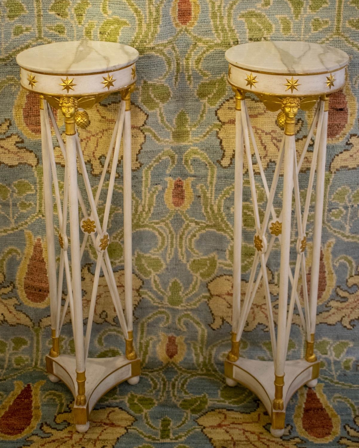 TORCHERES, 110cm H x 32cm D, a pair 20th century Italian white painted and parcel gilt with circular