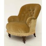 ARMCHAIR, Victorian walnut with yellow velvet upholstery, buttoned back and arms and turned