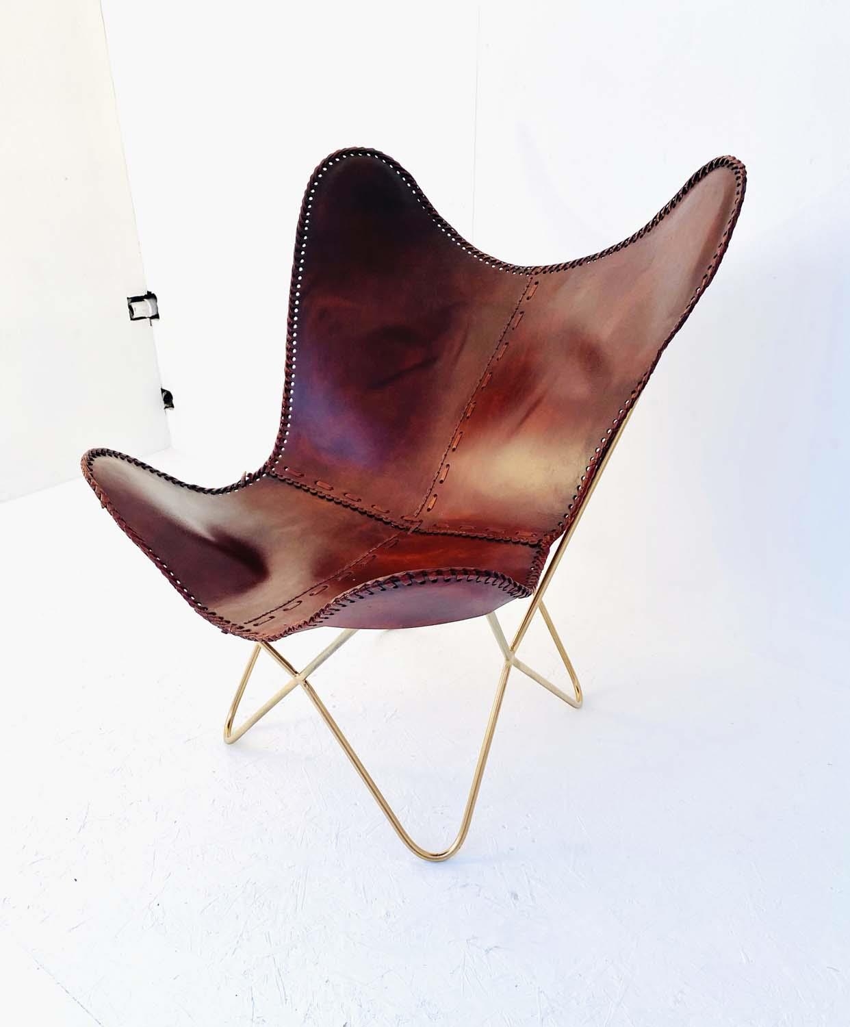 AFTER BONET, FURGHAN AND FERRARI HARDOY BUTTERFLY STYLE CHAIR, 92cm high, 82cm wide, 75cm deep.