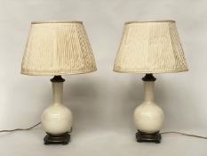 TABLE LAMPS, a pair, cream crackelure ceramic and bronze mounted of gourd form with silk pleated
