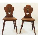 CHALET HALL CHAIRS, a pair, 19th century Swiss hand painted pine of cleated construction, 44cm W. (