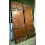 DOORS, each 231cm H x 75cm excluding hinges, a pair, early 20th century stained pine and iron