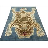 FINE TIBETAN TIGER RUG, 228cm x 168cm.