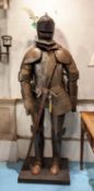SUIT OF ARMOUR ON STAND WITH SWORD, 190cm H.