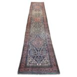 ANTIQUE FEREGHAN RUNNER, 498cm x 101cm.