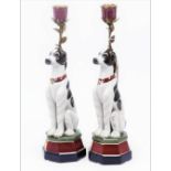 DOG TABLE CANDLESTICKS, a pair, Continental style porcelain and gilt metal mounted, 34cm H. (2)