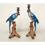 PARROT CANDLESTICKS, a pair, Continental style polychrome procelain and gilt metal mounted, 53cm