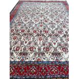 ANTIQUE PERSIAN QUM CARPET, 325cm x 220cm.