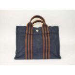 HERMÈS UNISEX FOURRE TOUT PM TOTE, cotton canvas main internal compartment with one zippered pocket,