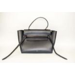 CELINE MINI BELT BAG, iconic trapeze design, top single handle, flap tucked into a leather strap