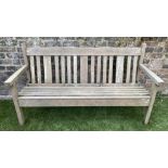 GARDEN BENCH BY LISTER, 154cm W, weathered teak of slatted construction.