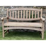 GARDEN BENCH, 122cm W, weathered teak, of slatted construction, with oval arched back.