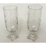 STORM LANTERNS, a pair, engraved cut glass of cylindrical form with facetted and stepped support,