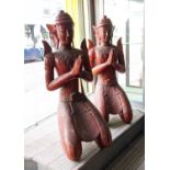 THIA THEPPANOM COUPLE, carved wood, red lacquered finish, 128cm H. (2)