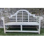 LUTYENS STYLE GARDEN BENCH, weathered teak of slatted construction after a design by Sir Edwin