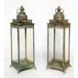 STORM LANTERNS, a pair, large verdigris framed and glazed, 55cm H. (2)