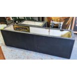 TROUGH PLANTERS, a set of two, 200cm x 50cm x 61cm at largest, black fibre glass. (2)