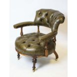 LOW LIBRARY ARMCHAIR, 74cm H x 68cm, Victorian walnut, circa 1860, in buttoned leather on ceramic