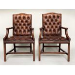 GAINSBOROUGH STYLE LIBRARY ARMCHAIRS, a pair, mahogany with buttoned tan brown leather throughout,