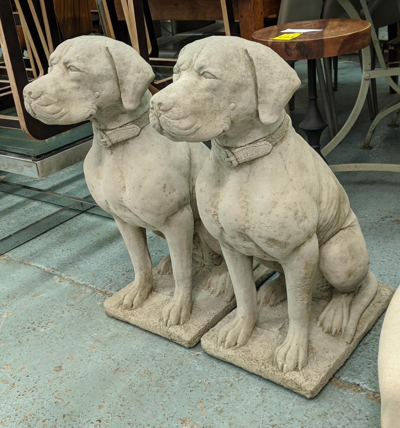 HOUNDS, a pair, composite stone, 73cm H, approx. (2)