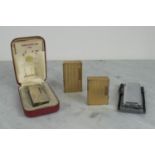 DUNHILL LIGHTERS, two 1970’s gold plated and one silver plated in box and one other. (4)