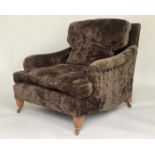 ARMCHAIR, in the manner of Howard and Sons, English early 20th century, circa 1900 deep velvet
