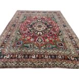 ANTIQUE PERSIAN CARPET, 337cm x 267cm.