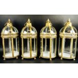 LANTERNS, a set of four, 46cm high x 19cm diameter, Regency style, gilt metal frames. (4)