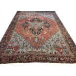 ANTIQUE PERSIAN HERIZ CARPET, 400cm x 293cm.