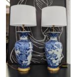 TABLE LAMPS, a pair, 90.5cm H, Chinese blue and white ceramic, with shades. (2)