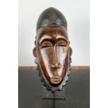 BAOULE MASK, Ivory Coast. 45cm H including stand.