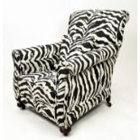 ARMCHAIR, early 20th century, upholstered in zebra print fabric, 80cm W x 89cm H.