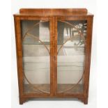 ART DECO DISPLAY CABINET, walnut with two circular glazed doors enclosing shelves, 92cm x 131cm H