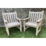 GARDEN ARMCHAIRS, a pair, silvery weathered teak of substantial construction, 68cm W. (2)