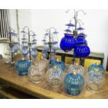 MOROCCAN GARDEN HANGING LANTERNS, on six stands with various coloured glass pumpkin lanterns, 98cm