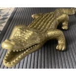 CONTEMPORARY SCHOOL, sculptural crocodile, gilt metal, 35cm W x 80cm D x 20cm H.