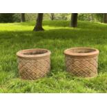 GARDEN PLANTERS, a pair, weathered terracotta with flower motif, 50cm W. (2)