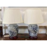 TABLE LAMPS, a pair, Chinese export style blue and white ceramic, each 51cm tall with shades. (2)