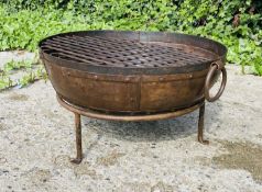 INDIAN KADAI FIRE PIT, 47cm H x 64cm x 60cm, on stand.