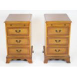 BEDSIDE CHESTS, 61cm H x 38cm x 43cm, a pair, Georgian style yewwood, each with slide above three