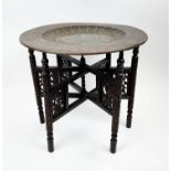 BENARES TABLE, round brass inlaid scalloped interior with anthemion and foliate decorated detail