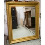 WALL MIRROR, 134cm x 109cm, 19th century giltwood and gesso with modern rectangular plate.
