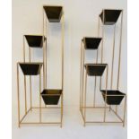 TIERED PLANTERS, pair, 145cm H x 49cm W, black troughs in gilt metal frame. (2)
