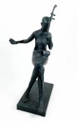 ABSTRACT MUSICIAN SCULPTURE, in floating seated position in verdigris finish, 87cm H.