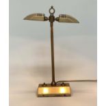 BANKERS/STUDY TABLE LAMP BY BESSELINK AND JONES, gilt lacquered bronze with opposing lidded lamps on