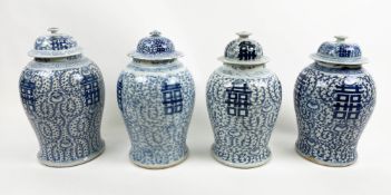 CHINESE BALUSTER VASES, four, blue and white decorated with lids, 45cm H. (4)