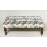 HEARTH STOOL, rectangular Colefax and Fowler upholstered with turned supports, 110cm W x 59cm H x